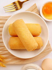 Yummy role cakes on a plate
