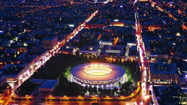 Aerial City Night Scene Footage Showcasing Stadium and Urban Lights