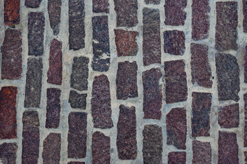 Knitted wall pattern made with natural stones