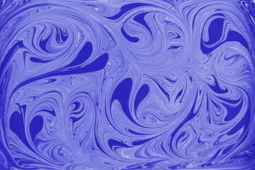 Blue and white acrylic paint swirls create abstract floral pattern
