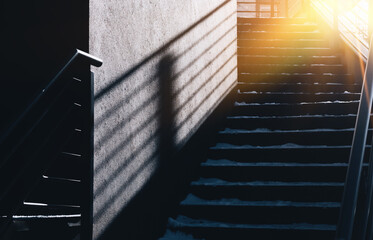 Dramatic Staircase with Deep Shadows, Winter Snow, and Golden Sunlight