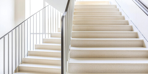 Obraz premium Modern empty Stairwell fire escape in a modern building. Stairs inside a multi-storey new building for fire evacuation, safety.