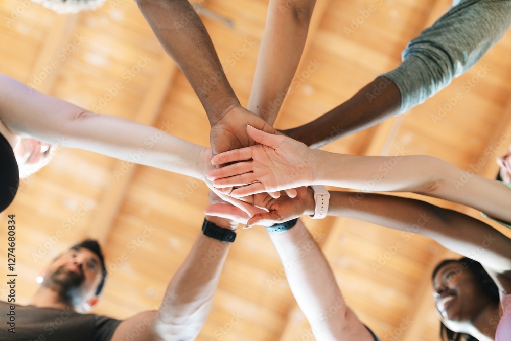 Poster diverse group of people joining hands in a circle. teamwork and unity are emphasized. hands of diffe