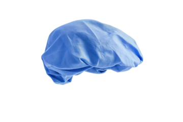 A floating blue fabric cap showcasing elegance and simplicity against a bright background isolated on transparent background