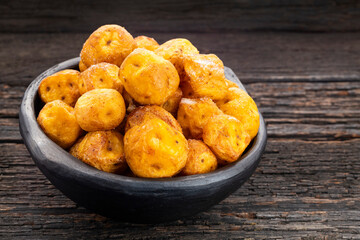 Crispy roasted yellow Potatoes - Creole potato Colombian food.