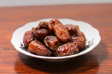 Close-up of a plate of delicious dried dates.
