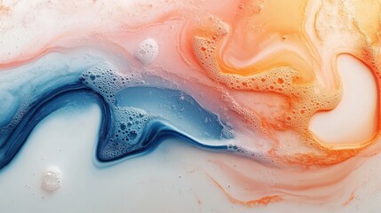 Obraz premium Abstract fluid art with blue and orange swirls and bubbles