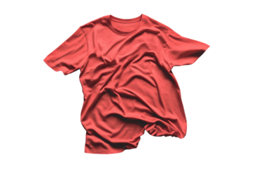 A crumpled red t-shirt casually laid out on a neutral background during a bright afternoon isolated on transparent background