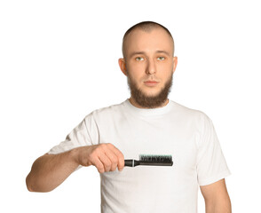 Baldness problem. Man with receding hairline holding brush on white background