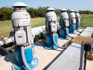 five vertical pumps on parallel array for treated water on a waste water treatment plant in Tampico...