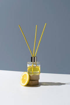 Glass aromatic diffuser with lemon slice and sunny ambiance