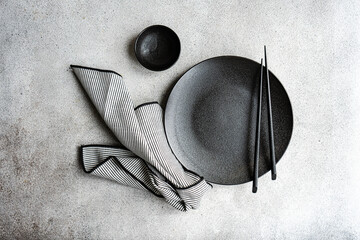 Minimalist black and white table setting with chopstick
