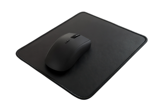A sleek black mouse resting on a minimalist mouse pad in a well-lit workspace setup isolated on transparent background