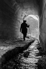 Obraz premium A Small Tunnel Walkway For People To Pass Through In The Heart Of The Highlands