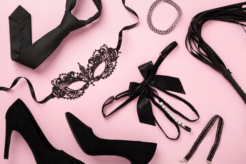Set of erotic accessories on color background, top view