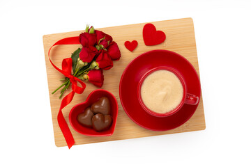 Wooden board with breakfast for Valentines day isolated on white, top view