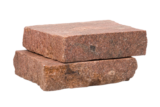 Two blocks of red stone are sitting on a white background, isolated