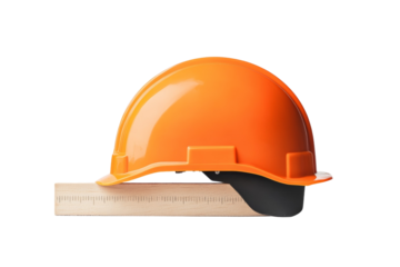 Safety helmet is placed on top of a ruler, isolated