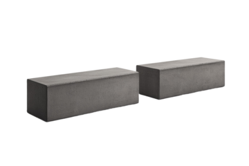 Two gray concrete blocks sit on a white background, isolated