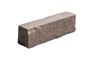Gray brick is laying on a white background, isolated