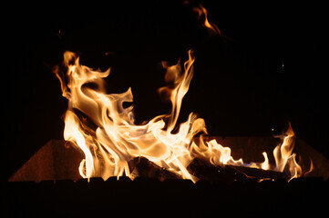 Vibrant flames dancing in darkness
