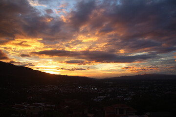 Sunset over the mountains and valley town