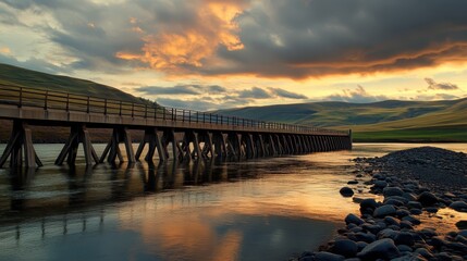 Obraz premium Serene Sunset Over Pier with Cloudy Sky and Reflective Water in Calm Landscape Scene