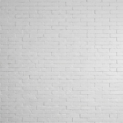 Obraz premium A clean white brick wall with a uniform pattern. The bricks have a slightly rough texture, with visible mortar lines. Soft lighting enhances the minimalistic, modern, and neutral aesthetic