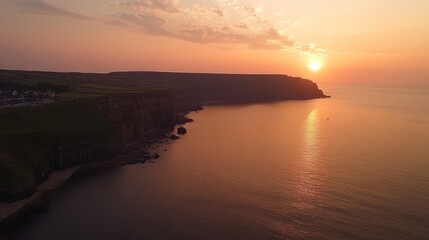 Coastal Cliffs Sunset Overlooking Serene Ocean Waters