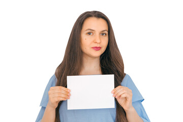 A young, attractive girl holding mockup with empty paper. A sign, an empty space for advertising, inscription, design. White background.