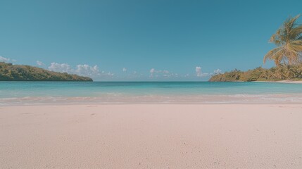 Obraz premium A serene beach scene with turquoise water and a clear sky, perfect for relaxation and travel.