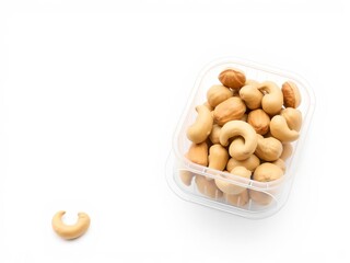 Cashews in a clear plastic bag, isolated on white background, isolated, container, nuts