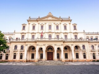 Obraz premium Medium shot of the elegant facade of the Culture Palace of Arad in Romania, showcasing its intricate architectural details and historical significance, Arad, culture palace, historical