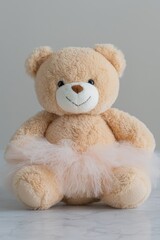 Obraz premium A plush teddy bear wearing a pink tutu, ideal for children's gifts or decor.