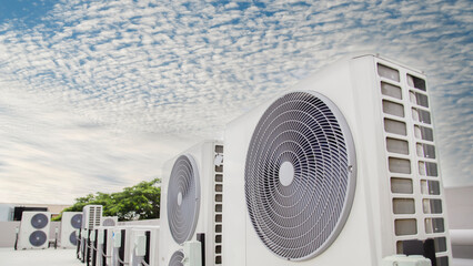 air conditioning and ventilation systems are installed on the roof of an industrial building.
