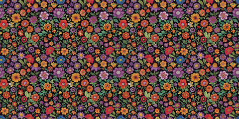 Colorful floral embroidery pattern with vibrant flowers on black background