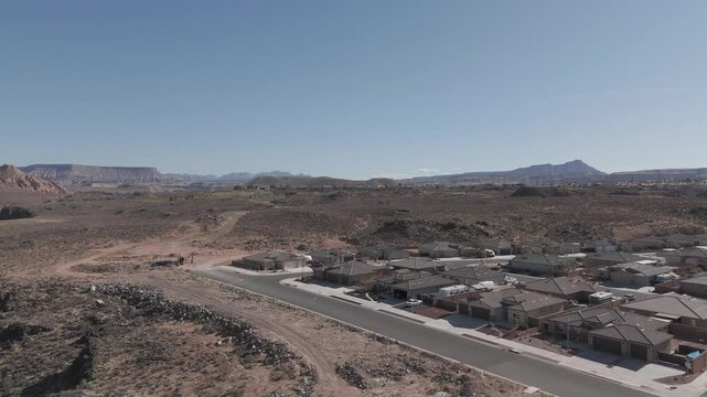 TOQUERVILLE FALLS, UTAH, USA - February 07, 2025: Aerial-Subdivision on rim of Virgin River Gorge - Pan
