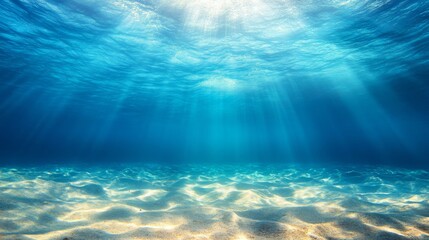 Fototapeta premium Sunlit ocean floor with clear blue water and sandy bottom