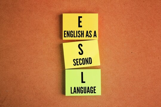 colored paper with the words English as a second language or ESL. the use of English by individuals whose mother tongue is different