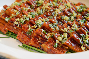 Grilled eel in Teriyaki sauce with garlic and sesame