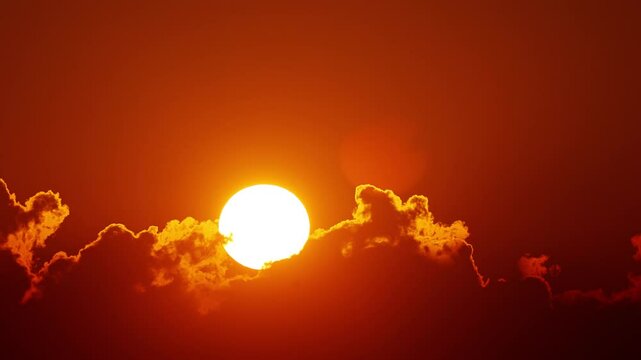 Time lapse of the sun rising behind clouds in Florida