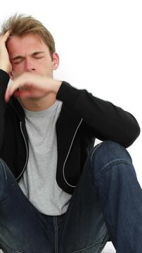 Upset young man thinking about his life