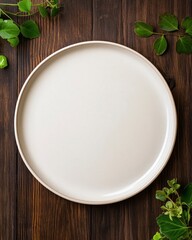 Empty Round Plate On Dark Wooden Table With Fresh Greens