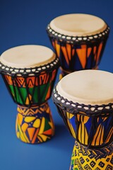 Colorful Drums on Blue Surface