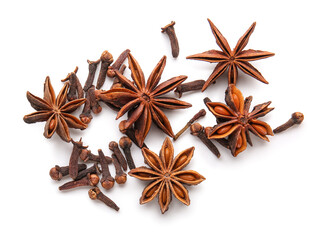 Star anise with cloves on white background, top view