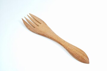 Wooden fork isolated on white background 