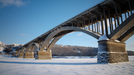 Bridge with four arches is covered in snow