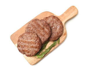 Wooden board with tasty meat cutlets and rosemary on white background