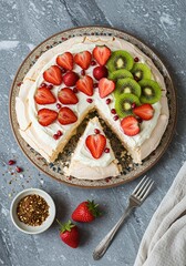 Photo of Pavlova Cake, covered with strawberry and kiwi whipped cream, a slice of cake cut out