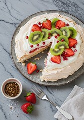 Photo of Pavlova Cake, covered with beautiful strawberry and kiwi whipped cream